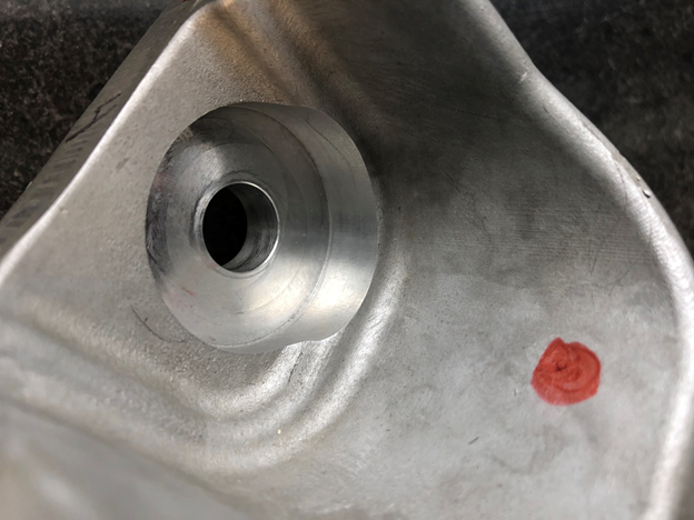 Deep bore machined into an aluminum die casting